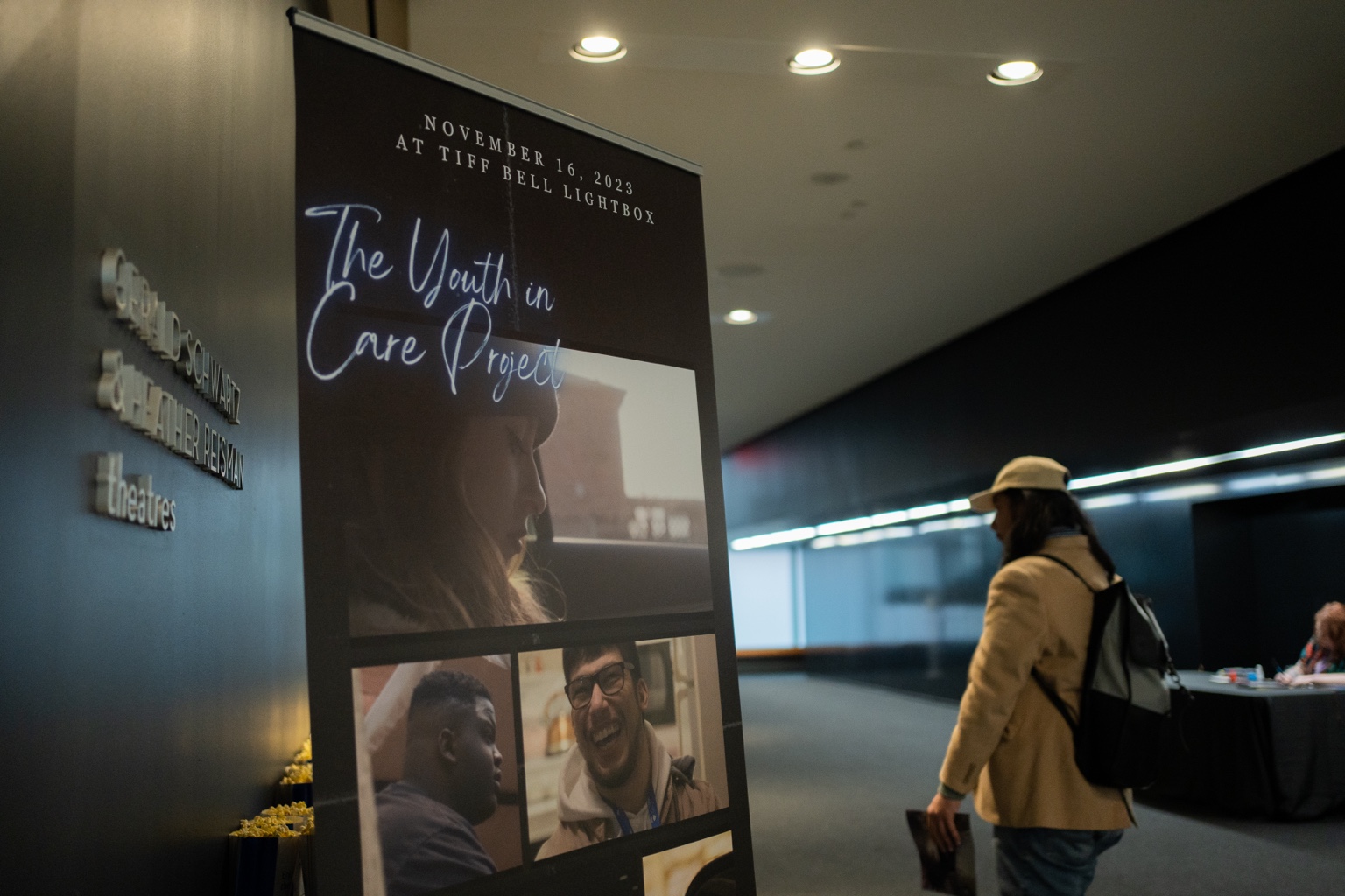 The Youth in Care Project poster displayed at the premiere venue